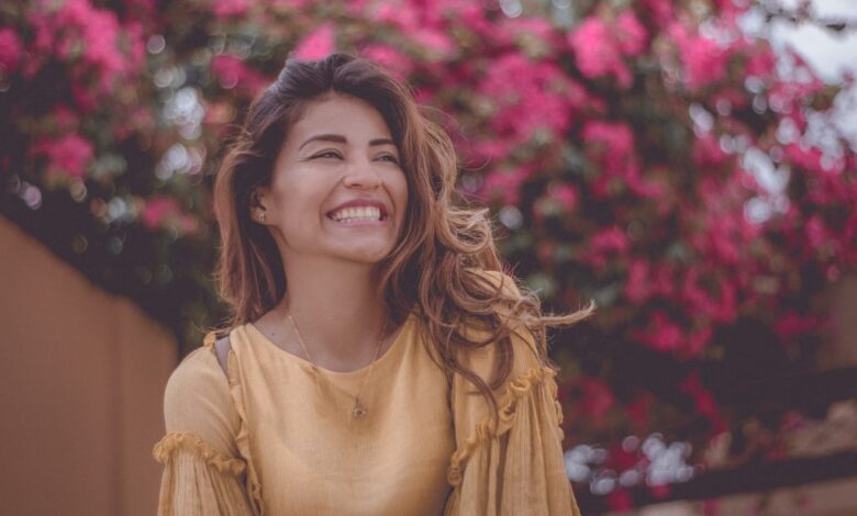 Woman laughing and smiling 1024x683