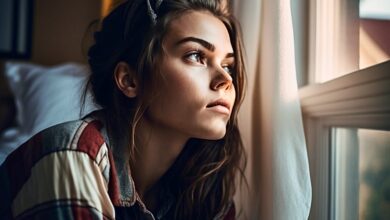 joelbrown beautiful woman sitting on bed looking out window suf 9a549308 3685 4554 8da3 9406bb8ddcc9 2 1000x600