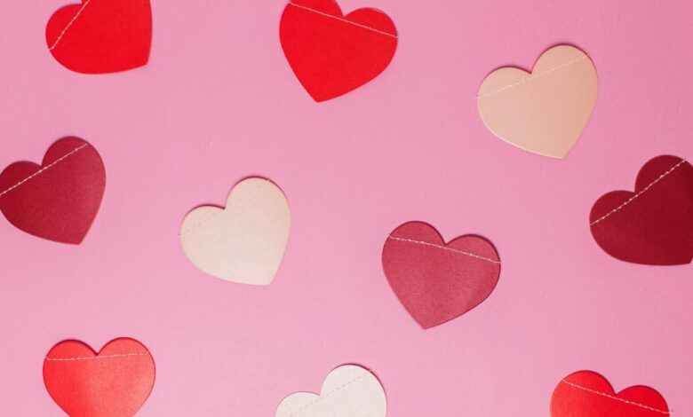 Hearts hanging on a pink wall 1024x683