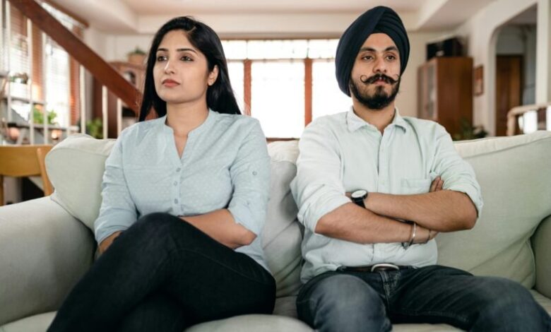 offended young indian couple sitting on sofa stockpack pexels scaled e1724077723428