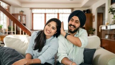 playful indian spouses having fun on sofa during weekend stockpack pexels scaled e1724754846550